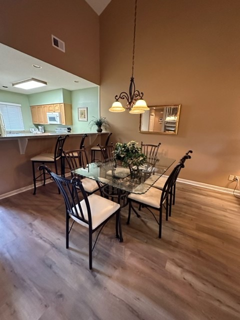 Our beautiful dining area with the new LPV flooring.